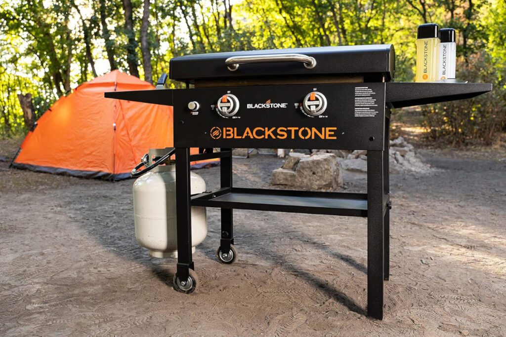 Blackstone 1883 Original 28-inch Griddle showcased in a stylish kitchen setting, highlighting its large cooking surface and durable design for outdoor grilling and cooking enthusiasts.