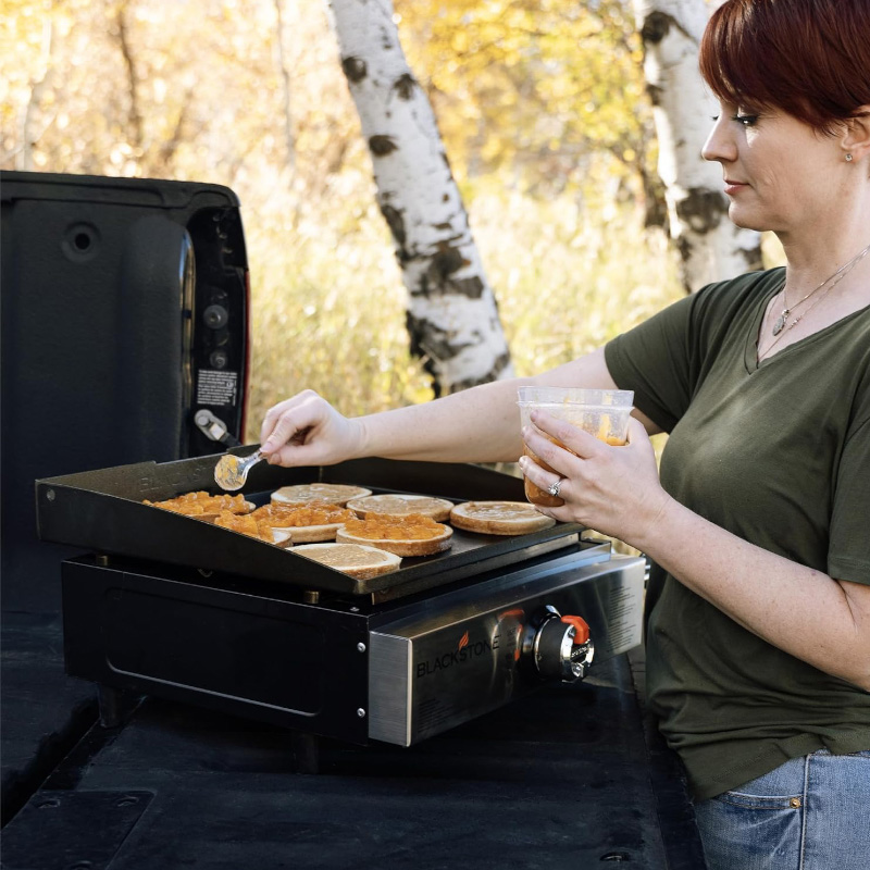 Blackstone 1971 Original 17-inch Tabletop Griddle showcasing delicious cooking in progress, perfect for outdoor grilling and family meals.