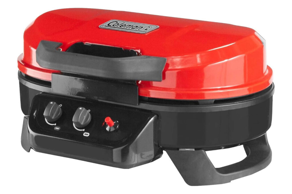 Close-up of the Coleman RoadTrip 225 Portable Tabletop Propane Grill showcasing its sleek design and convenient features, perfect for outdoor cooking and camping adventures. Best Coleman Grill.