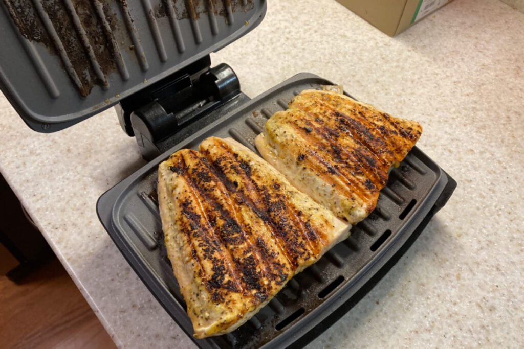 George Foreman Fully Submersible Grill showcasing its innovative design and features for easy cleaning and cooking versatility.