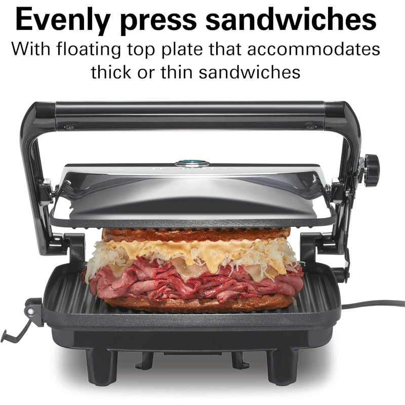 Hamilton Beach Panini Press Sandwich Maker pressing a delicious sandwich evenly for perfect toasty results