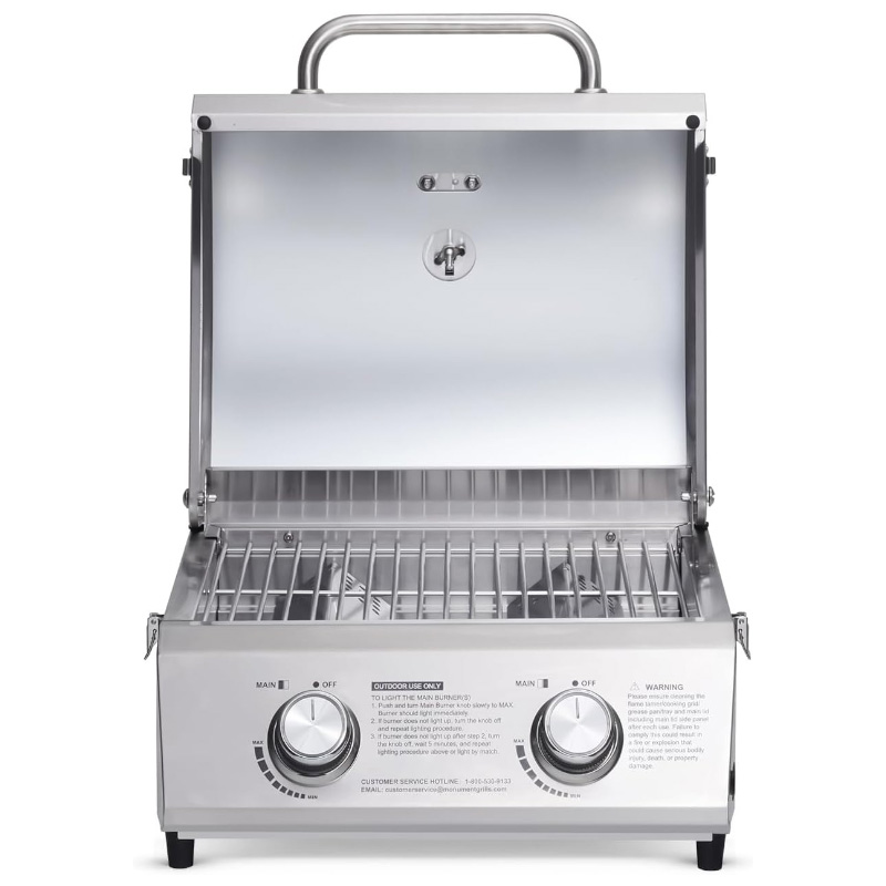 Monument Grills 13742 Tabletop Gas Grill open, showcasing its sleek design and spacious cooking area, perfect for outdoor grilling enthusiasts. Monument Grills Tabletop Propane Gas Grill