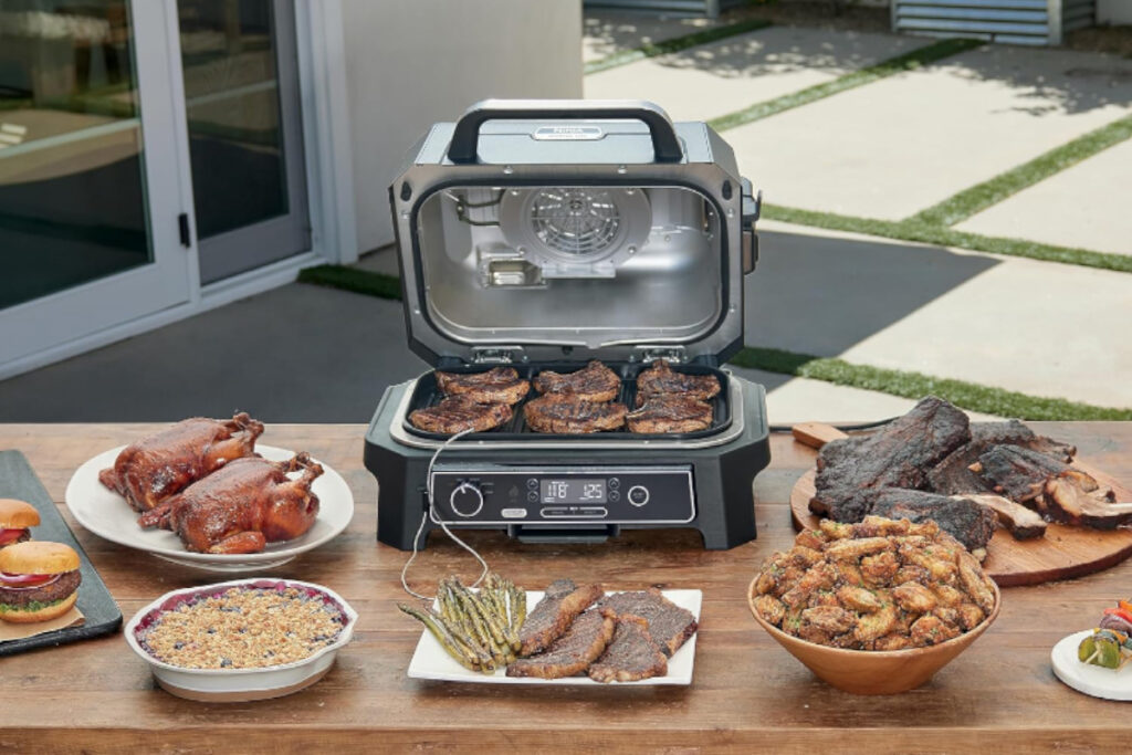 High-quality Ninja OG850 Woodfire Pro XL Outdoor Grill and Smoker showcasing its sleek design and multifunctional features perfect for outdoor cooking enthusiasts.