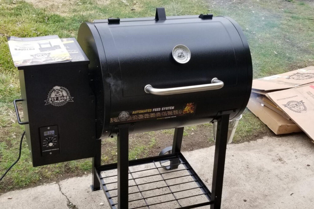 Pit Boss PB440FB1 Pellet Grill - High-quality outdoor cooking appliance for grilling, smoking, and BBQ enthusiasts, featuring a large cooking surface and digital control panel for precise temperature management.