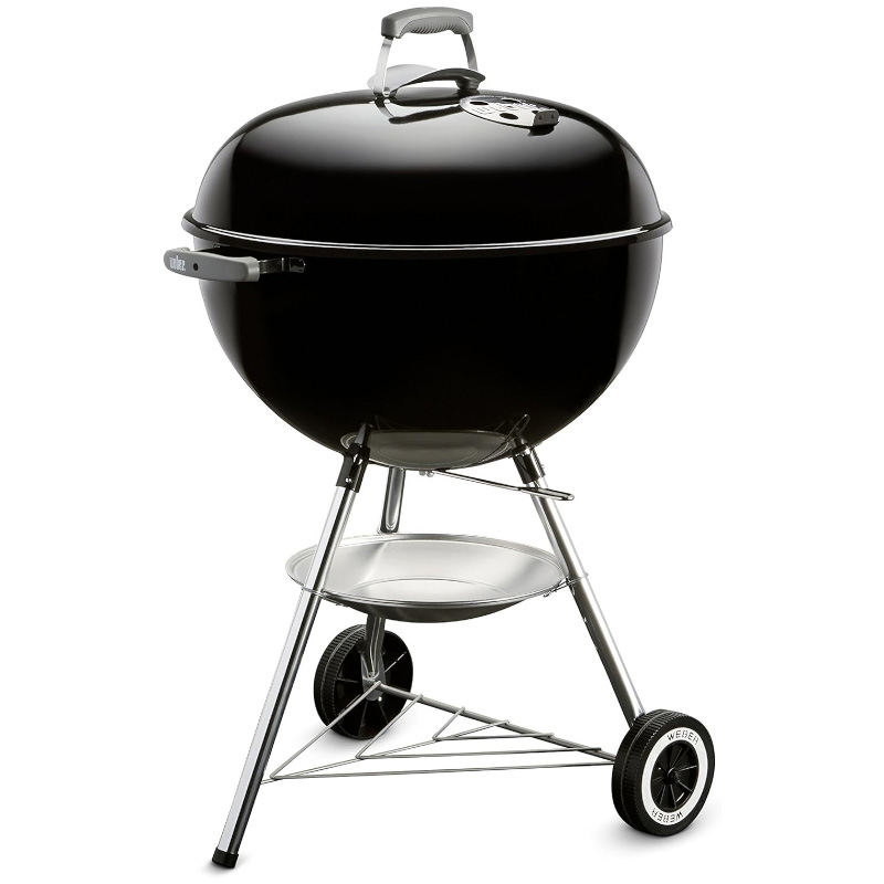 Close-up of Weber Original Kettle 22-Inch Charcoal Grill showcasing its classic design, black finish, and chrome-plated cooking grate, perfect for outdoor barbecues and grilling enthusiasts. Best Grills