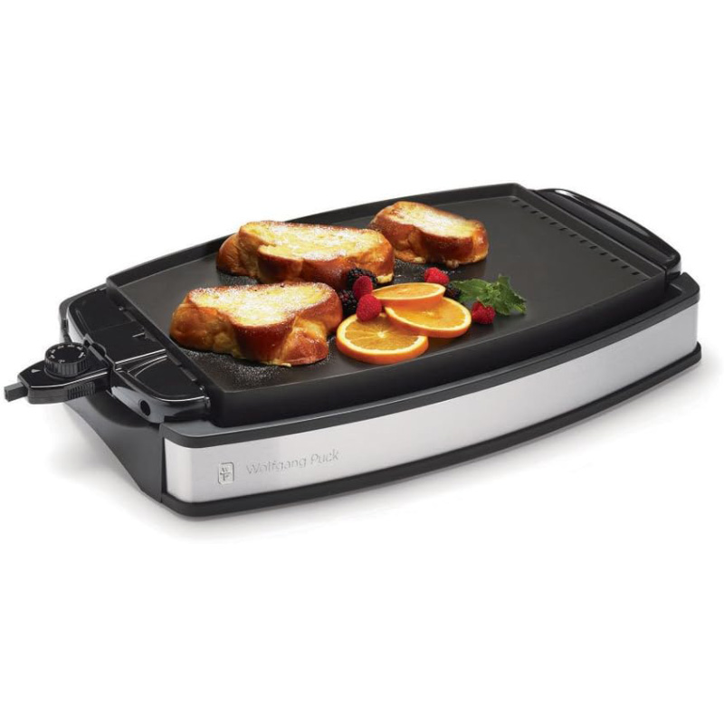 Deliciously cooked food on the Wolfgang Puck XL Reversible Grill Griddle, showcasing a variety of grilled vegetables and meats, perfect for versatile cooking and meal preparation. Best Griddle of 2025
