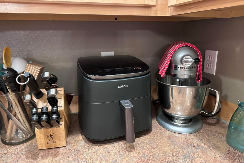 COSORI 9-in-1 Air Fryer - Versatile kitchen appliance showcasing multiple cooking functions for healthier meal preparation.